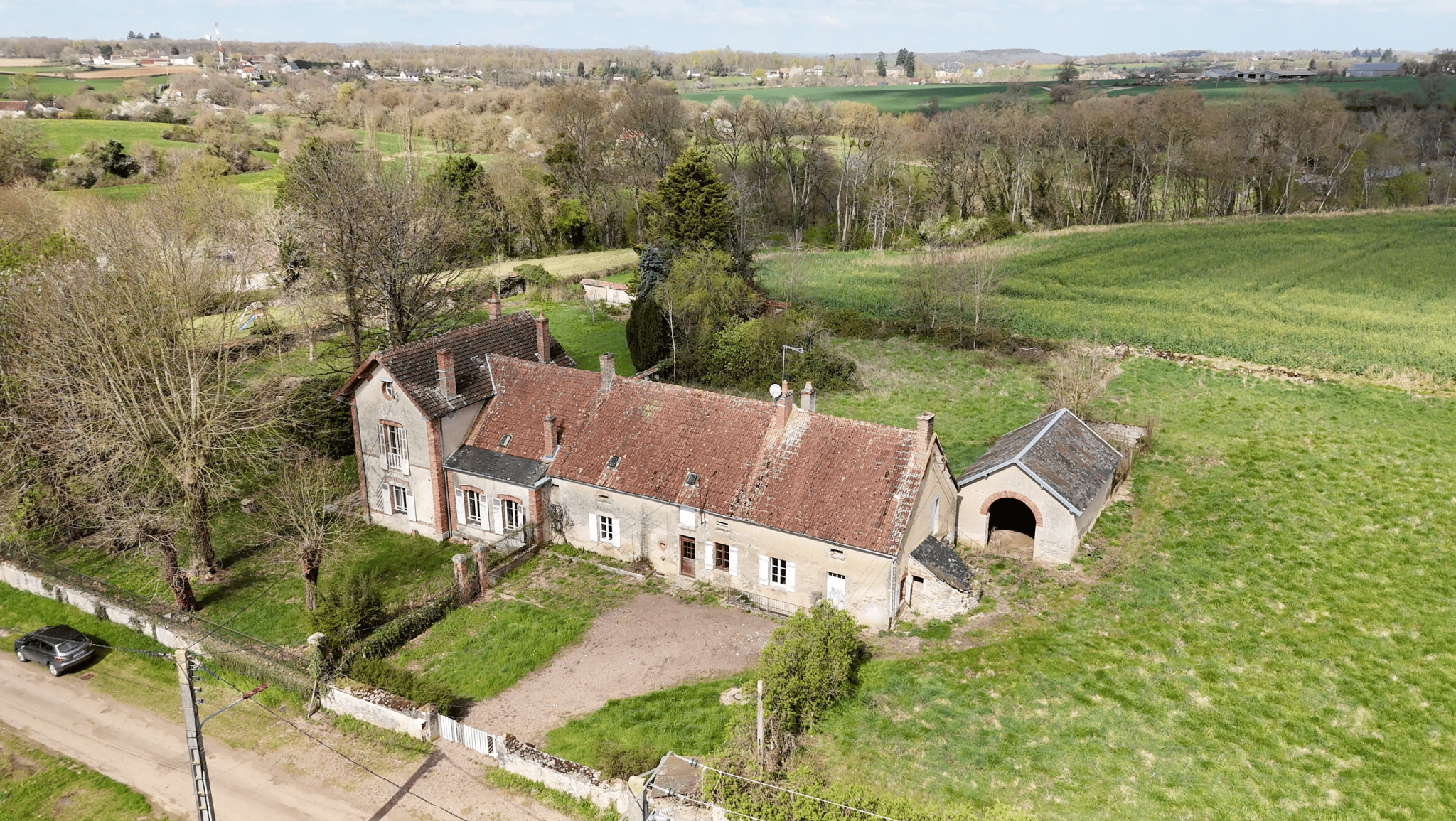 Propriété avec 2 habitations et parc arboré